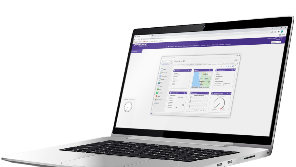 Öppen silverfärgad laptop som visar gränssnittet för affärssystemet Pyramid Hybrid Cloud. Wiig Data erbjuder IT-tjänster för en trygg och stabil arbetsvardag.